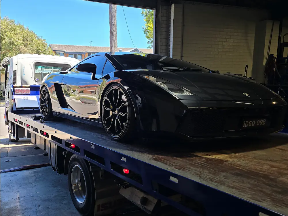 a prestige vehicle being towed